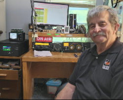 Ham radio operator with radio equipment